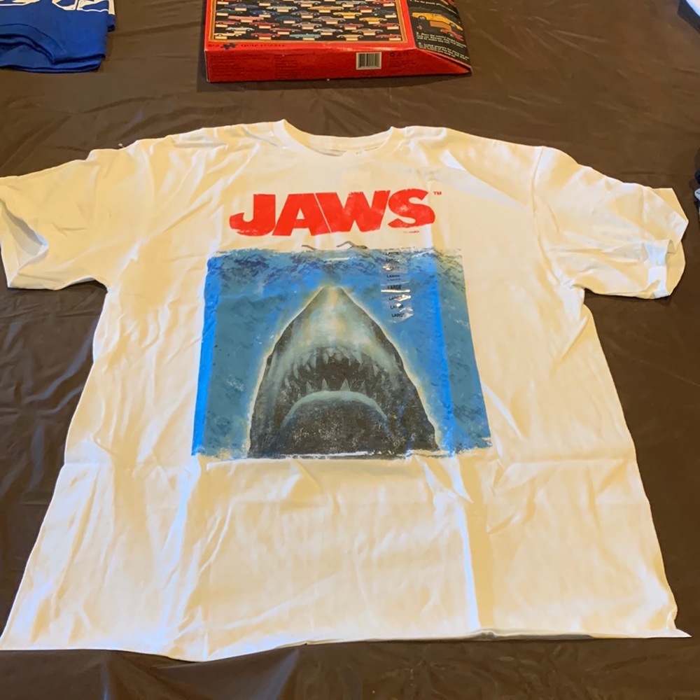 Large Jaws print t-shirt. New condition. one copy with tags and one without.